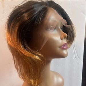 Motown Tress Woman’s Synthetic Swiss Lace Front Wig Blonde Ombré Layered Bob